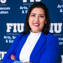 Professional headshot with FIU background Leslie Nisbet-Gonzalez